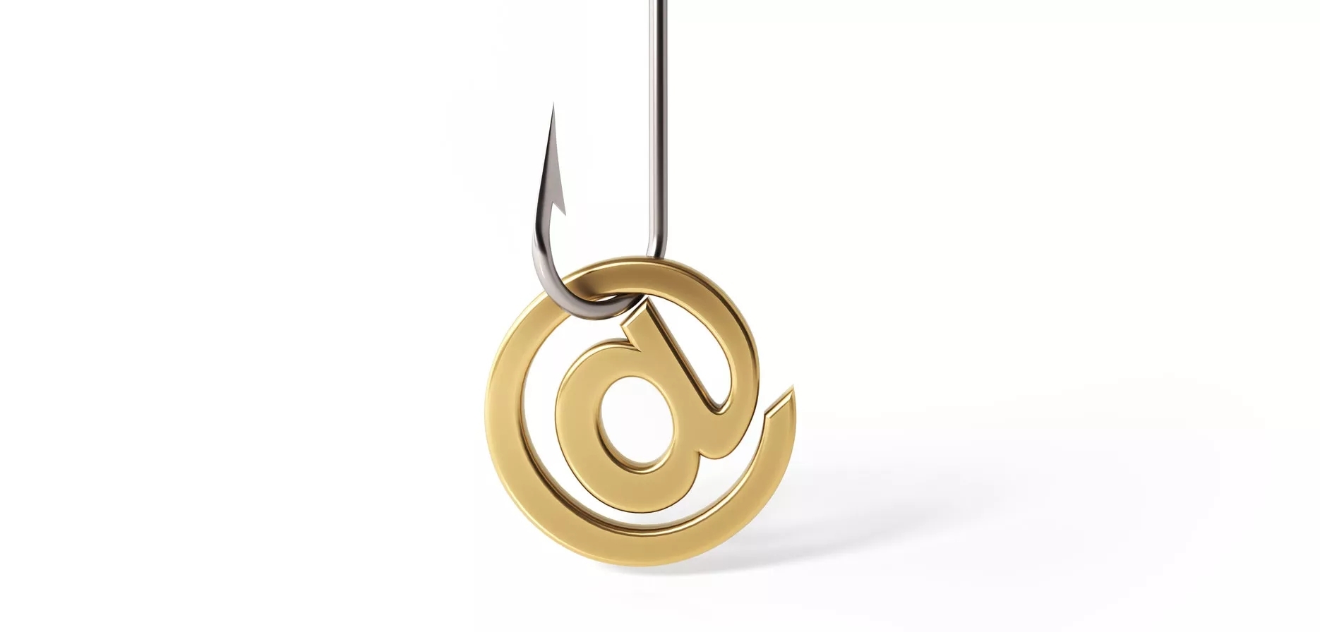 A gold, metal version of @ symbol on a fishing hook.