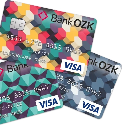 Three custom credit cards with colorful geometric patterns by artist Chad Mize.